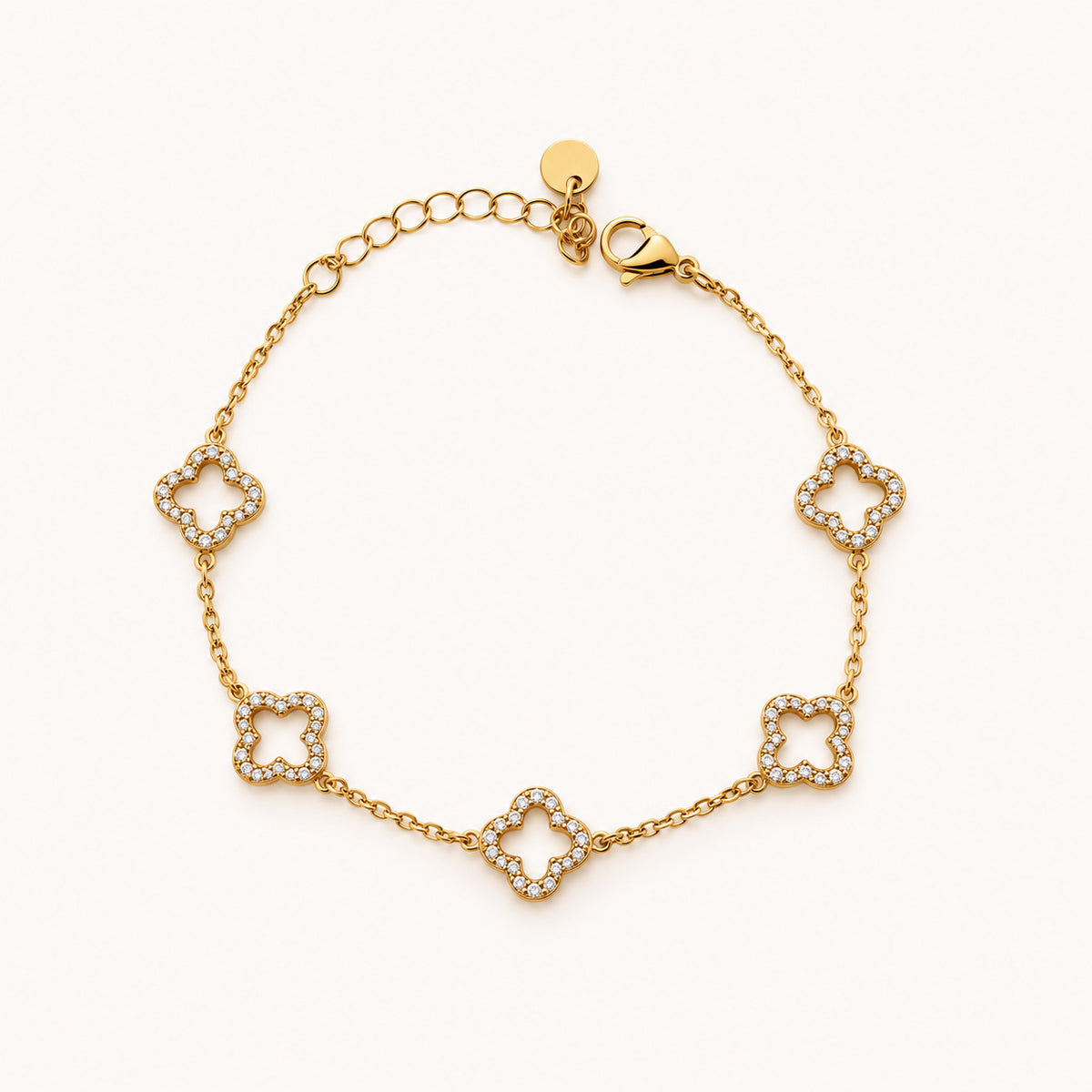 Bracelet Fortuna doré, cinq trèfles ajourés cerclés de strass